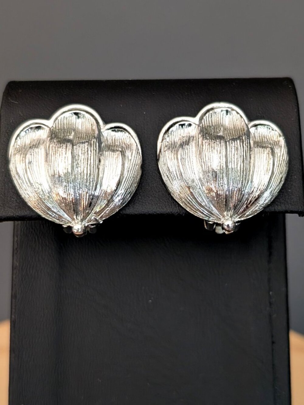 Etched silver tone clip on earrings